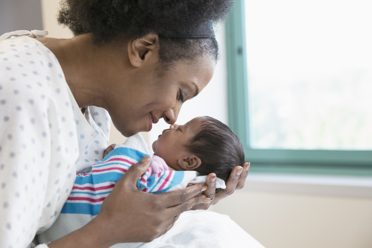 Mother with newborn at hospital room