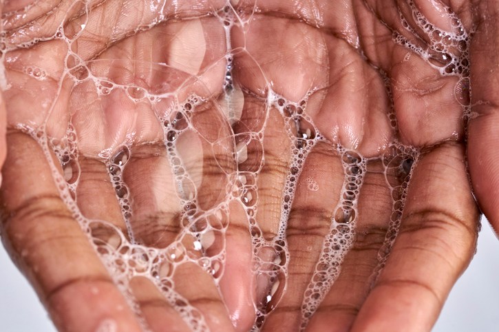 Close up of a black woman hand with soap