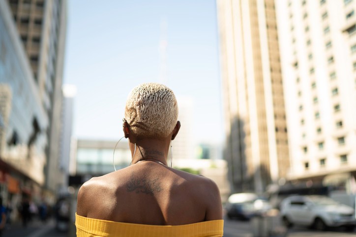 Rear view of a woman walking in the city