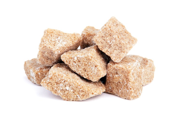 Brown sugar isolated on white background