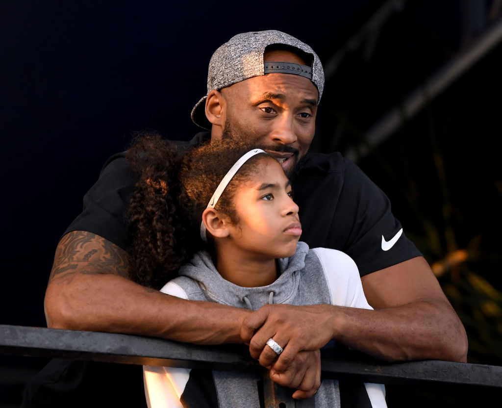 GIANNA AND KOBE BRYANT AT THE PHILLIPS 66 NATIONAL SWIMMING CHAMPIONSHIPS,