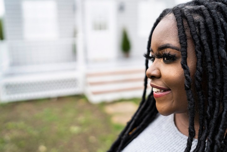 Portrait of smiling young african woman
