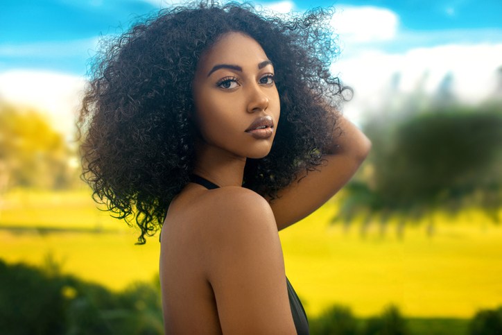 Long Haired woman with tropical background