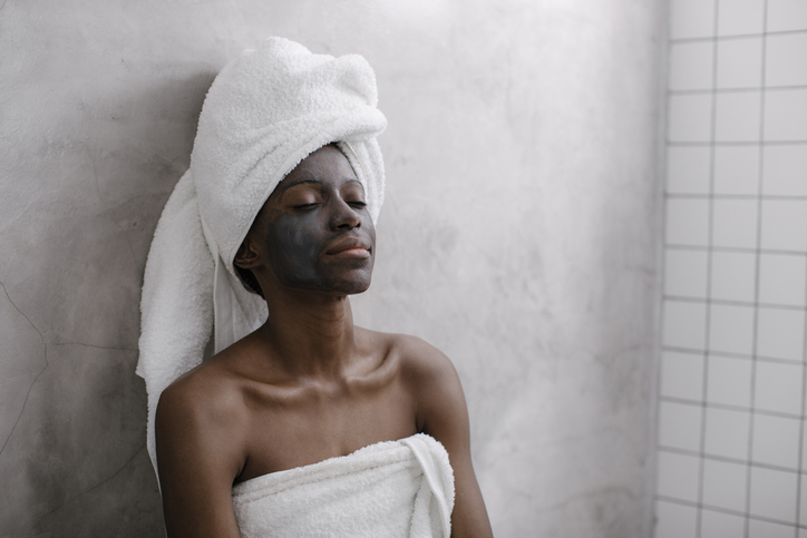 Portrait of a Woman with Charcoal Face Mask