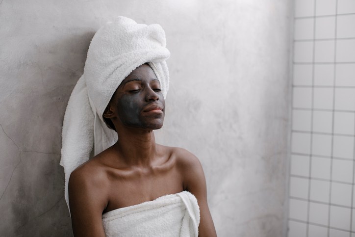Portrait of a Woman with Charcoal Face Mask