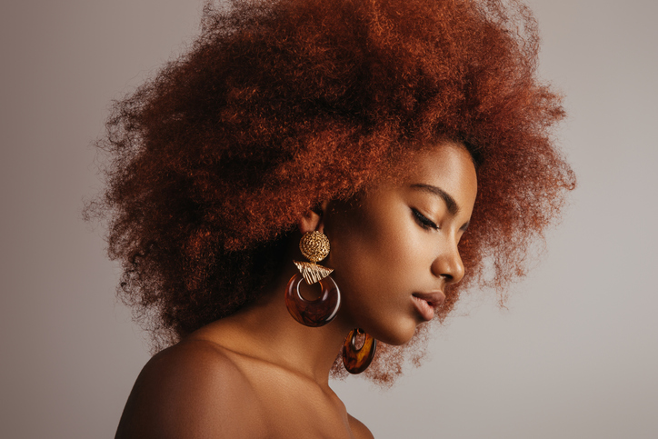 Beautiful afro girl with earrings