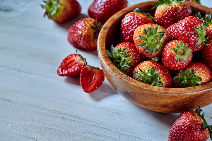 Fresh strawberries on a wooden table