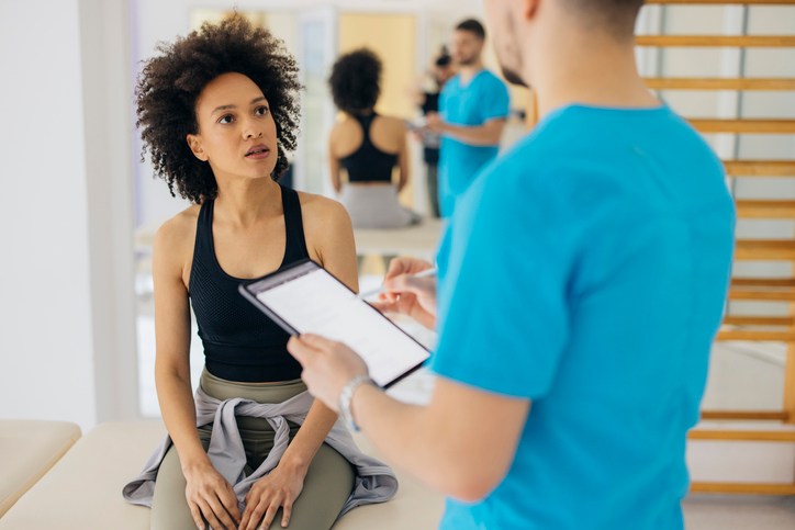 Beautiful African American Woman Talking With the Doctor