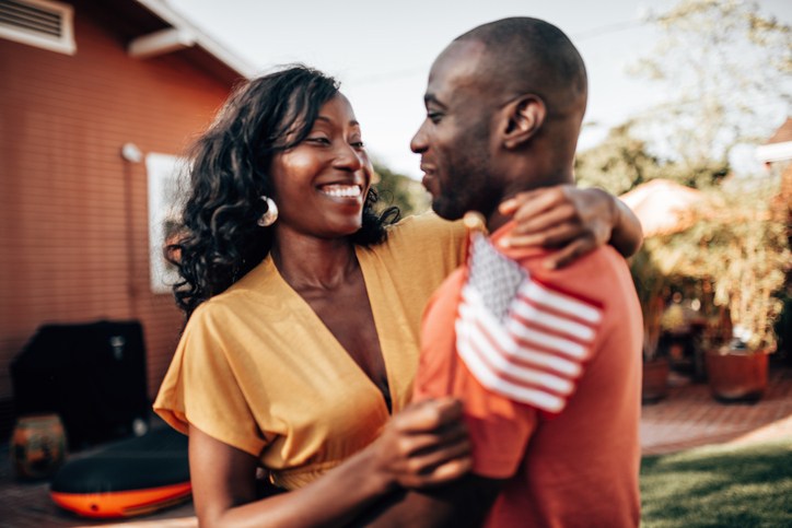 couple celebrating at home the fourth of july