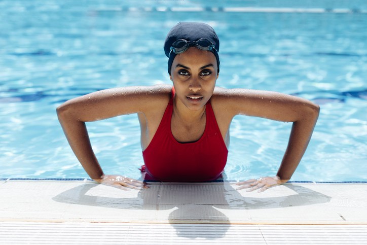 Portrait of young woman in swimming pool