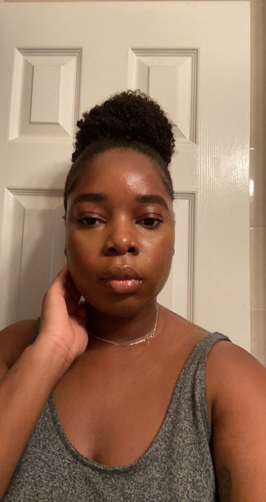 Tatayana Yomary using Milani Cosmetics Make It Last Sunscreen Setting Spray