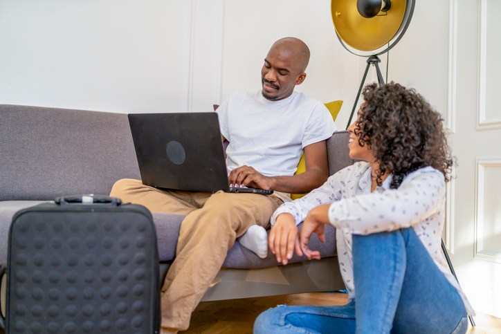 Afro couple shopping online