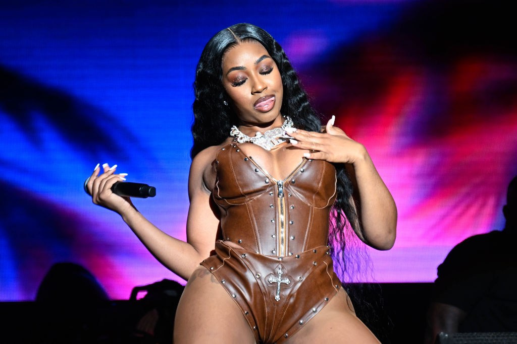 Looks like it's about to be a "Caresha Please" summer. Yung Miami looked good af modeling a gold bikini on Instagram.