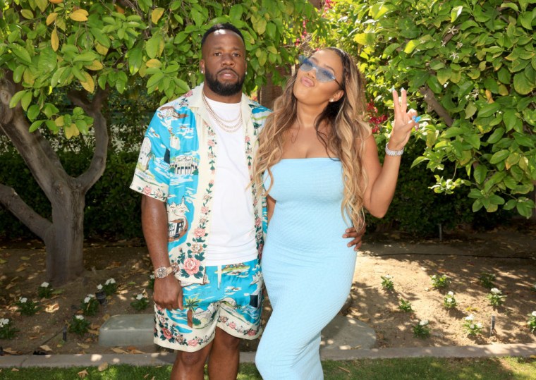Yo Gotti and Angela Simmons at the Interscope Coachella Party.