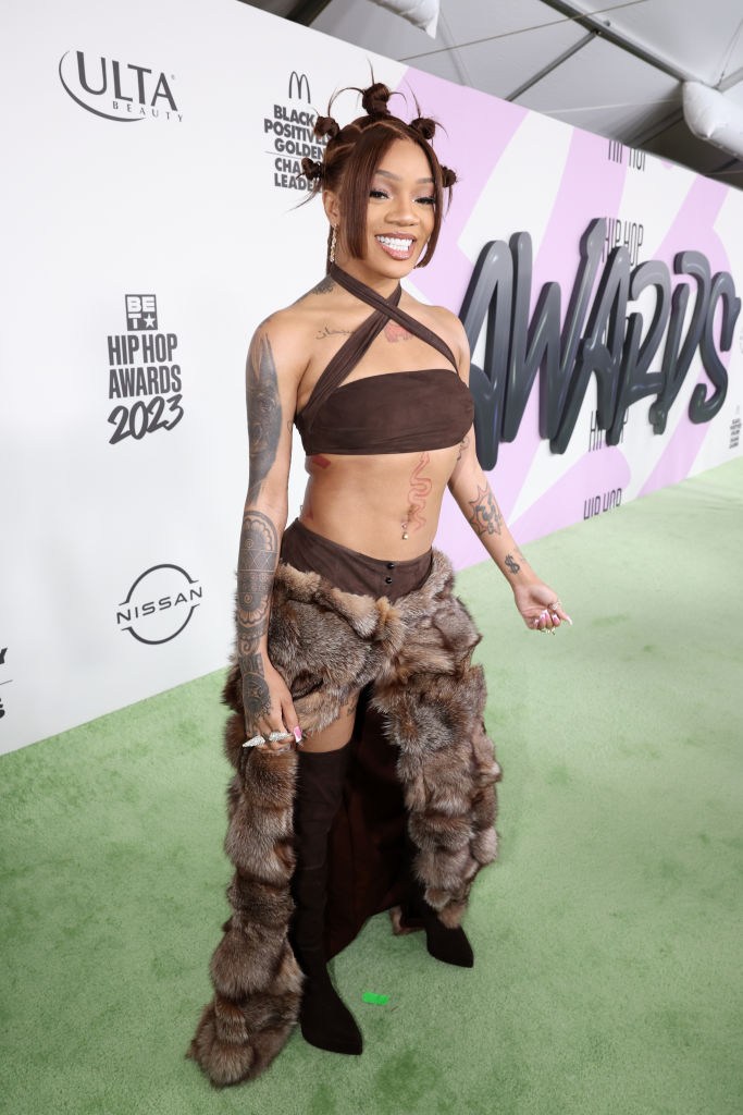 GloRilla: Brown Fur Skirt