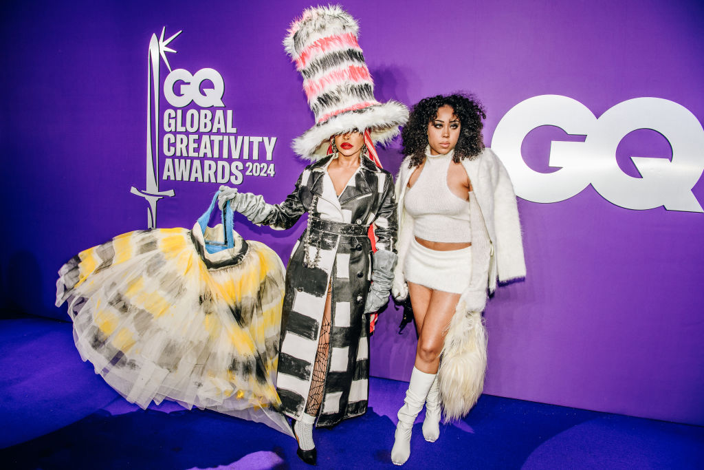 Erykah Badu and twin Puma Sabti Curry