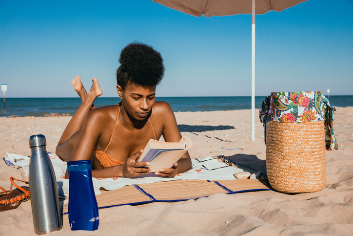 Woman enjoying summertime at the beach