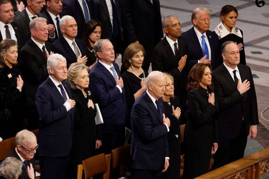 why wasn't michelle obama at carters funeral