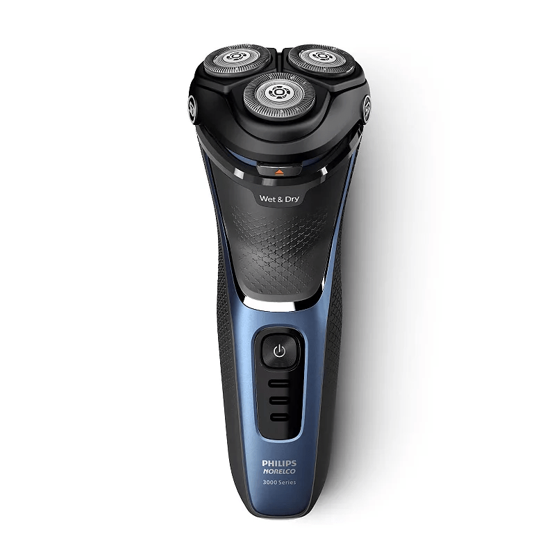 A black and gray electric shaver with three circular shaving heads and a power button. The device is labeled "Philips Norelco 3000 Series".